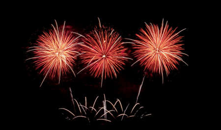 Fireworks with different color and pattern for celebration in various event including new year, party, ceremony, birthday or other show and display on night dark sky background.の写真素材