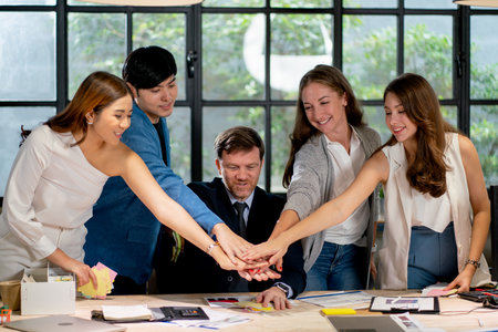 Business man and woman with multiethnic show action of participate and cooperate to get successful...