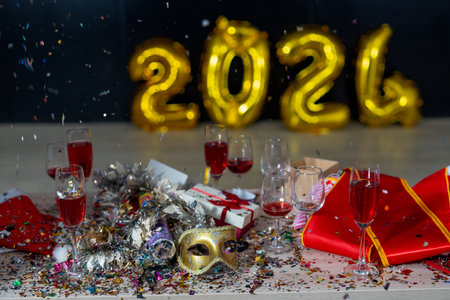 Main focus on mask on table with other accessories for 2024 new year party.の写真素材