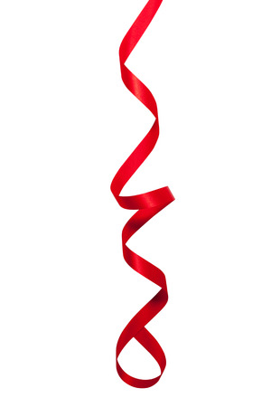Shiny red ribbon on white backgroundの写真素材