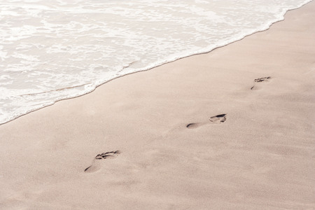 Footprints in the sandの写真素材