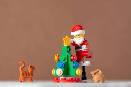 Bangkok, Thailand. December 14,2016 - Santa Claus Lego minifigure preparing christmas tree decorations. Studio shotのeditorial素材