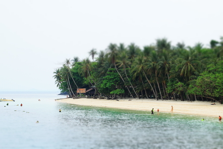 Island beach view, tilt-shift focus style