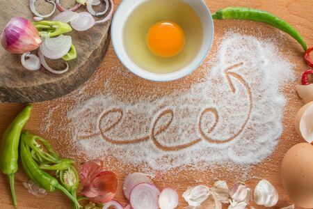 cooking ingredients on wood background, top viewの写真素材