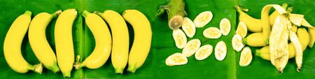 The banana is flat on the leaf, the top line is naturalの写真素材