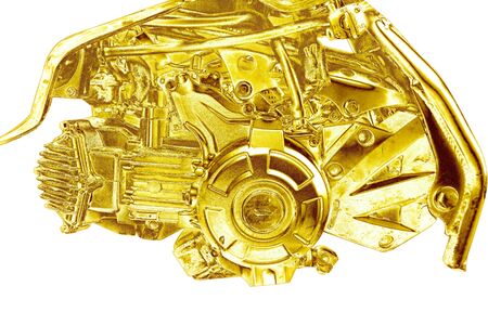 Motorcycle engine shiny gold sparkling white backgroundの写真素材