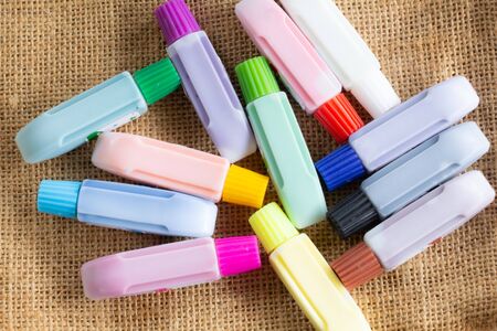 Watercolor equipment, with 12 colors, brown backgroundの写真素材