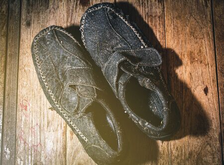 Old shoes have not been used for a long time.の写真素材