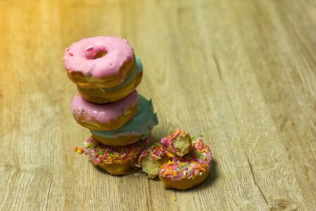 Donut 
Many colors are available on wooden floors.の写真素材