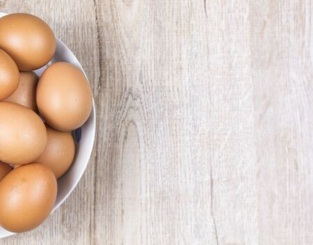 Eggs are long, busy on wooden floors.の写真素材