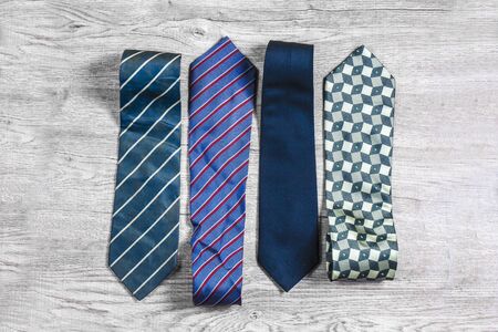 necktie Laying on the wooden floor 
White tone backgroundの写真素材