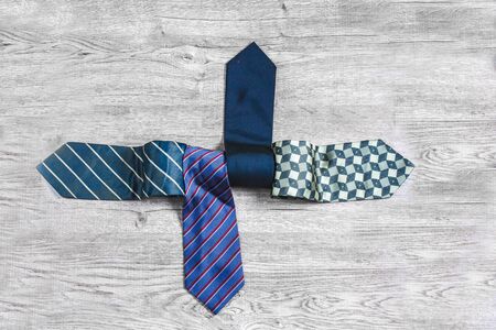 necktie Laying on the wooden floor 
White tone backgroundの写真素材