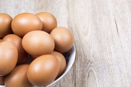 Eggs are long, busy on wooden floors.の写真素材