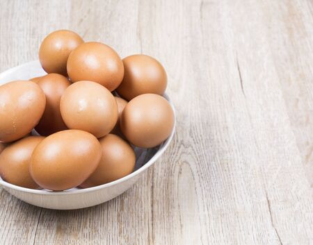 Eggs are long, busy on wooden floors.の写真素材