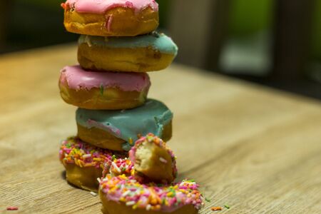 Donut 
Many colors are available on wooden floors.の写真素材