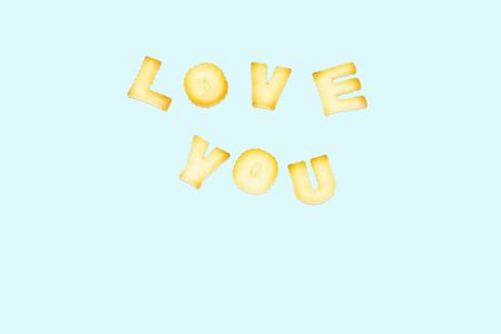 Alphabet Bread love you blue background textの写真素材