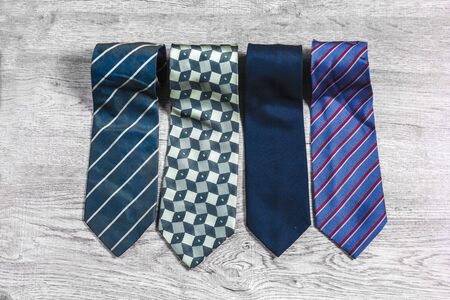 necktie Laying on the wooden floor 
White tone backgroundの写真素材