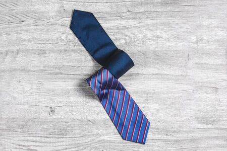necktie Laying on the wooden floor 
White tone backgroundの写真素材