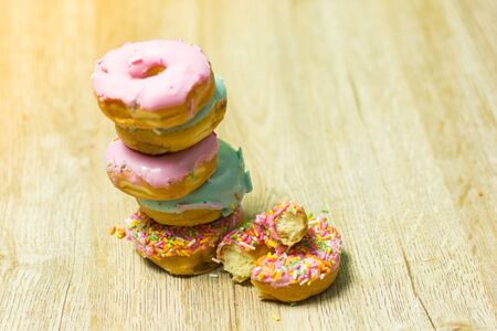 Donut 
Many colors are available on wooden floors.の写真素材