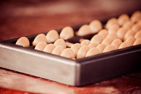 Abacus, a calculator ancient wooden.の写真素材