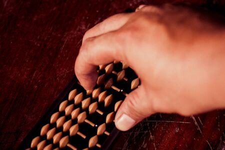 Abacus, a calculator ancient wooden.の写真素材