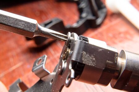 Engine Repair and tiny tiny screwdriver.の写真素材