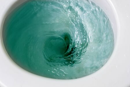 flush toilet  Blue water  Cleanliness