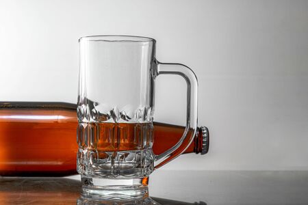 Beer and glasses for beer Gray white backgroundの写真素材