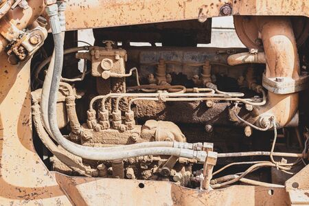 Old yellow-tone tracked tractors, heavy-dutyの写真素材