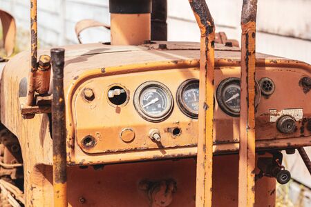 Old yellow-tone tracked tractors, heavy-dutyの写真素材