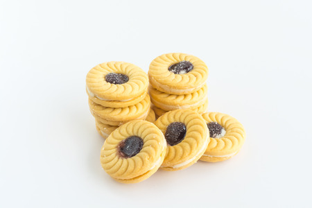sandwich cookies with cream and blueberry flavoured jamの写真素材