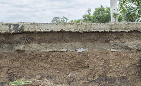 Layer of soil beneath the Concrete road.Caused by soil collapse.の写真素材