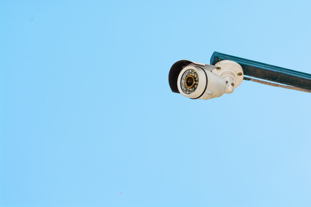 cctv cameras on blue sky background