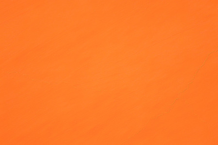 Orange abstract background texture. Blank for design, dark orange edgesの写真素材