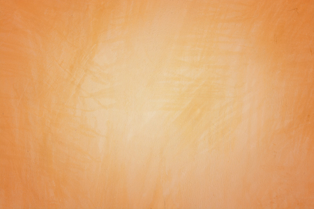Orange abstract background texture. Blank for design, dark orange edgesの写真素材
