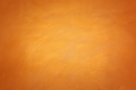 Orange abstract background texture. Blank for design, dark orange edgesの写真素材
