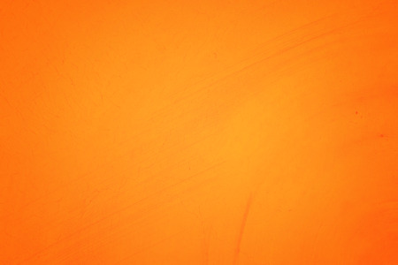 Orange abstract background texture. Blank for design, dark orange edgesの写真素材