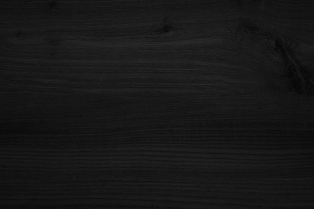 Black wood texture background blank for designの写真素材