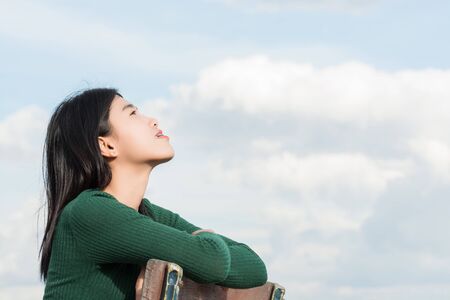 Women breathe oxygen in pure nature. Portrait woman.の写真素材