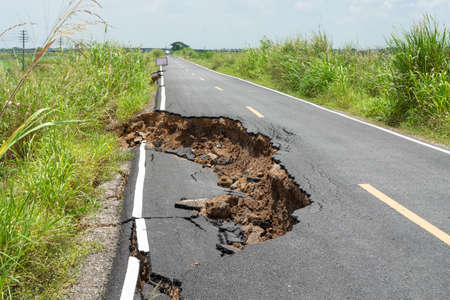 Asphalt surface on the street was demolished due to poor construction.の写真素材
