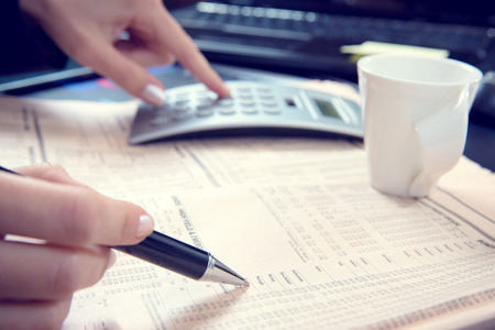  Business woman calculating の写真素材