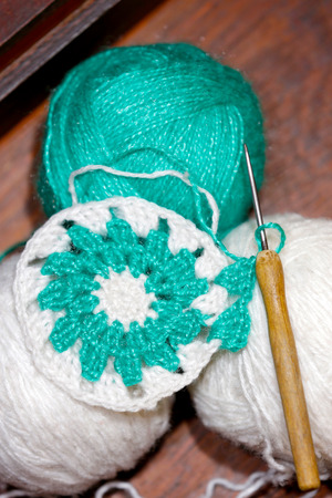 Several balls for crochet lace , in wooden box.の写真素材