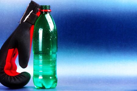 Sport items isolated against blue background.の写真素材
