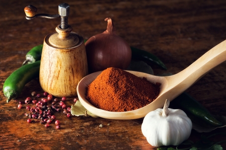 Fresh vegetables and various spices on wooden table.の写真素材