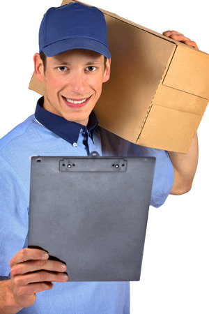 Smiling delivery man isolated on white.の写真素材