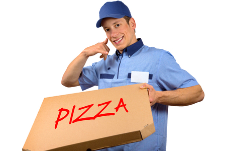 Pizza delivery man holding pizza box and making a phone gesture, isolated on white background.の写真素材
