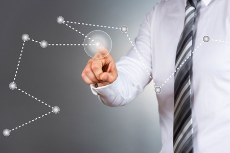 Modern business pointing at business graph.の写真素材