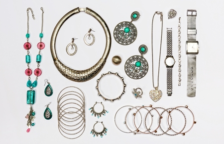 Set of various silver jewelry, isolated on white background.Top view.の写真素材