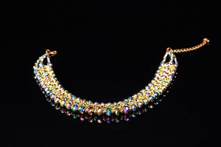 Shiny,elegant necklace. Isolated on black background.の写真素材