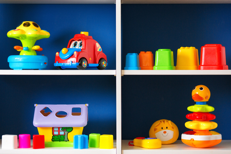 Colorful children`s toys on top of the shelf.の写真素材